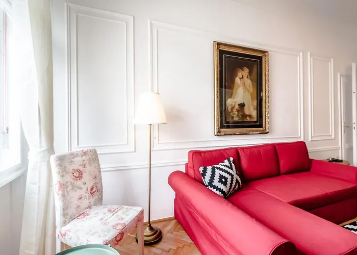 Golden Esthetic With Red Sofa